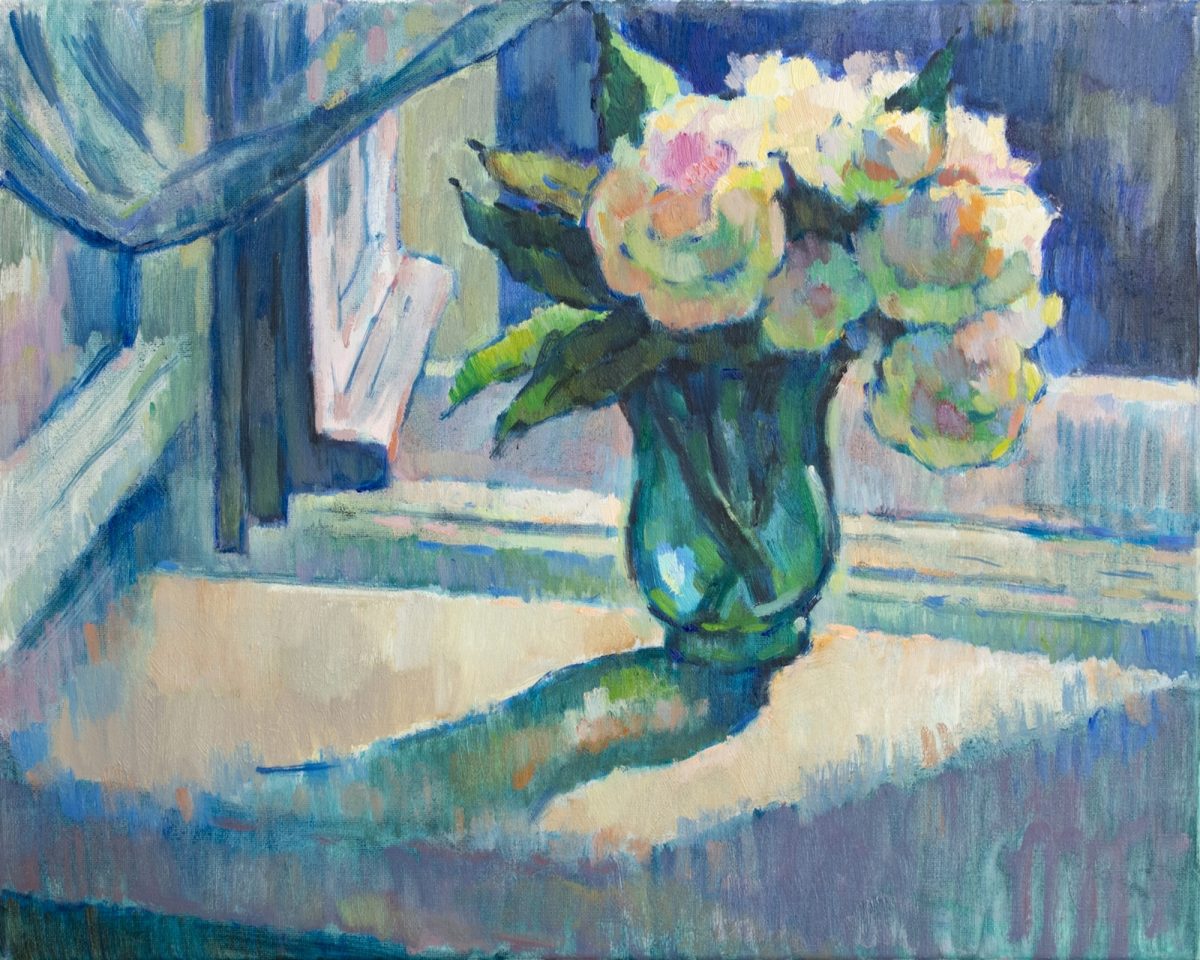 Still life with a romantic bouquet of peonies on the windowsill