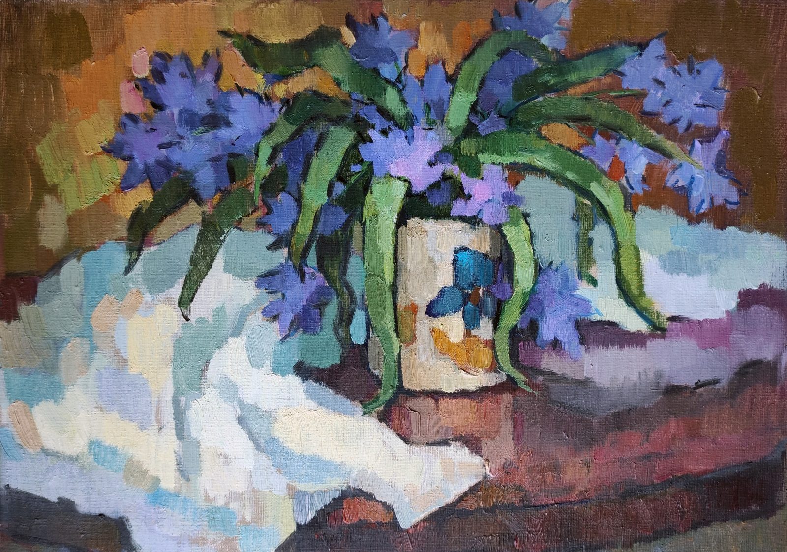 Still life with a small bouquet with blue flowers